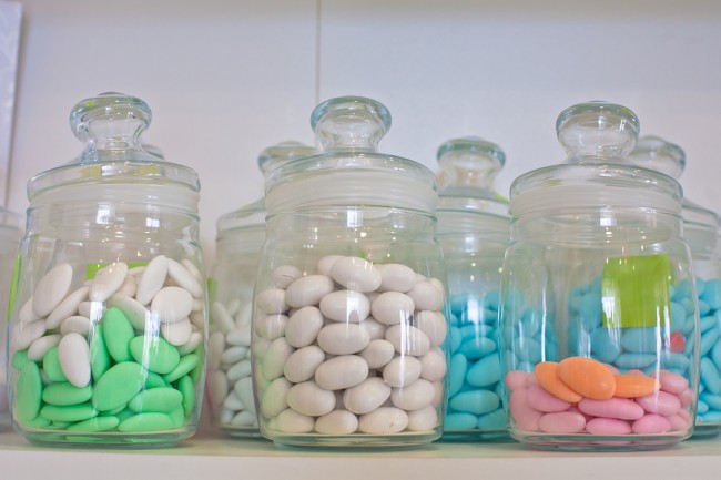 vintage drugstore glass jar with colored pills